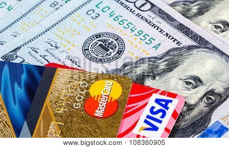 Credit Cards, Visa And Mastercard, With Us Dollar Bills