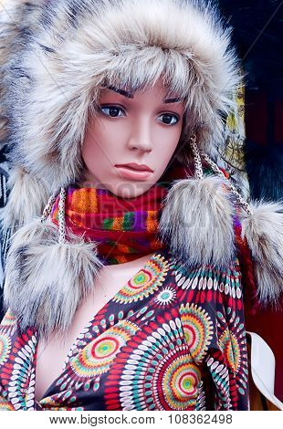 Closeup Of A Woman Mannequin In A Winter Fur Hat