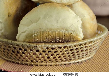 Small  loaf fresh household bread in the breadbasket