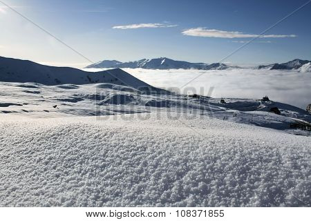 View Of The Georgian Ski Resort Gudauri With Freshly Fallen Snow In The Foreground.