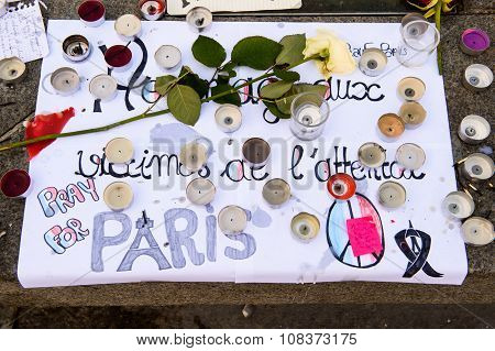 Messages, Candles And Flowers In Memorial For The Victims