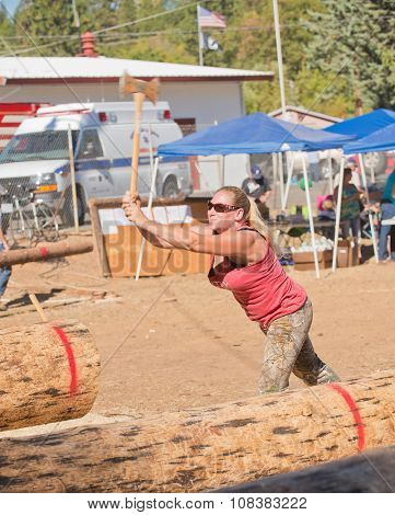 West Point, CA - October 4, 2014 Axe throwing & Chainsaw log cutting competitions at the Lumberjack Day Parade event