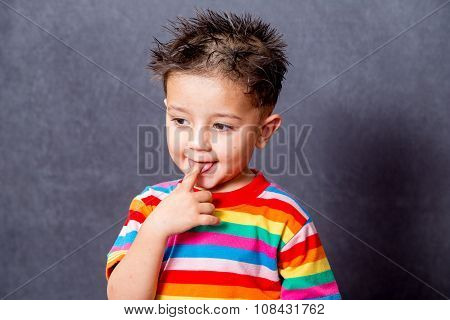 naughty  expiration. boy fashion portrait. Child model.