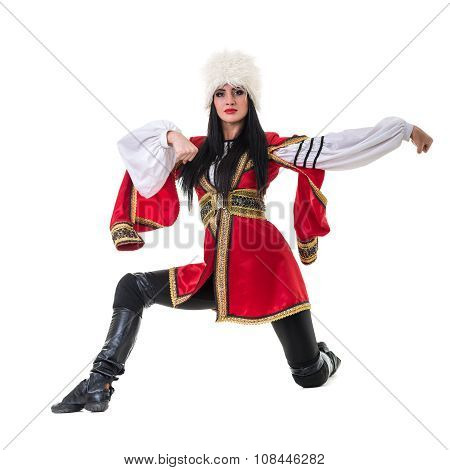 Young woman wearing a folk costumes dancing.  Isolated on white in full length with copyspace
