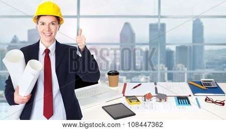 Woman architect in amodern office. Construction and renovation concept.