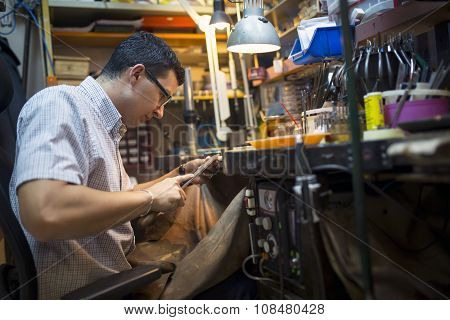 Jeweler Working