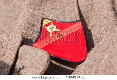 Distinctive Sign On An Old Greatcoat Of Russian Red Army
