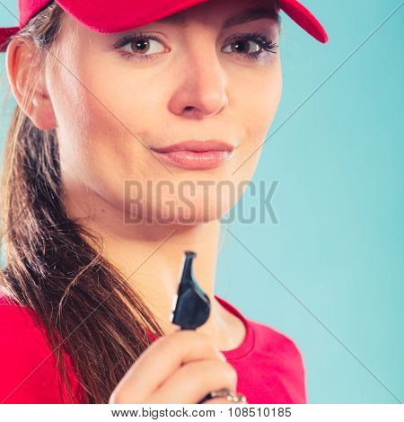 Lifeguard Woman In Cap On Duty With Whistle.