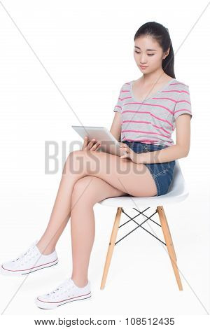 Girl Sitting On A Chair