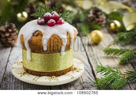 Christmas Fruit Cake Decorated With Icing And Berries