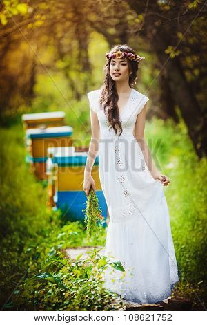 Beautiful young  young girl in spring garden