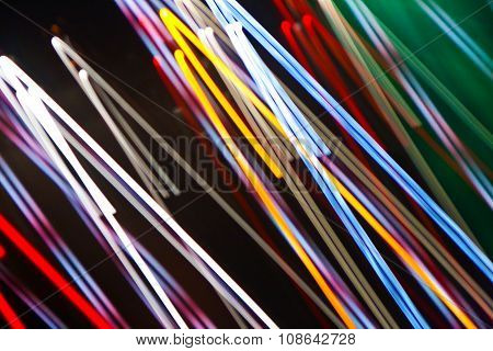 colorful abstract light efffects by night in red, blue, green, yellow