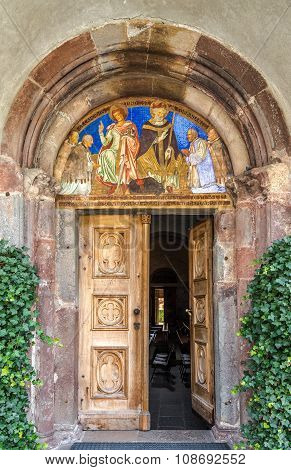 Painting Entrance To San Michele Church In San Candido