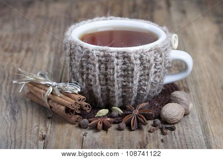 Cup Of Hot Spiced Tea  And Spices Around.
