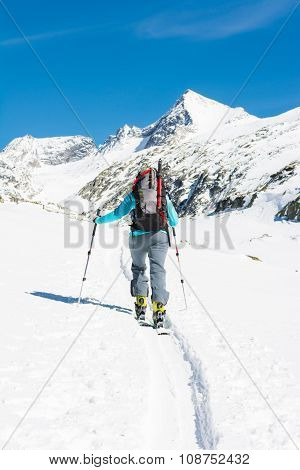 Ski touring in sunny weather.
