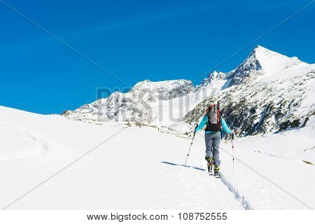Ski touring in sunny weather.