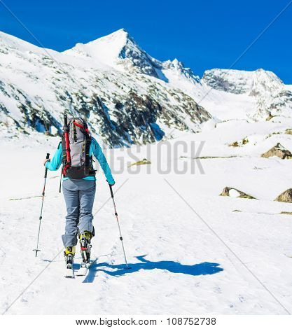 Ski touring in sunny weather.