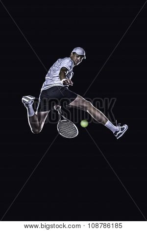 Tennis player reaching for the hard ball isolated