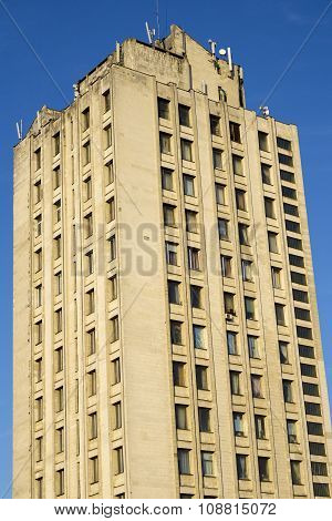 Kiev, Ukraine - July 15, 2015: Modern Multi-storey Yellow Big House On Background Of Blue Sky