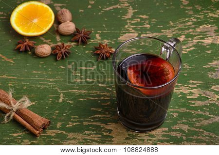 Mulled Wine, Punch And Spices For Glintwine On Vintage Wooden Background
