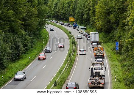 A light traffic jam with rows of cars. Traffic on the highw
