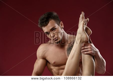 Futfetish. Sexy man touching shapely female legs