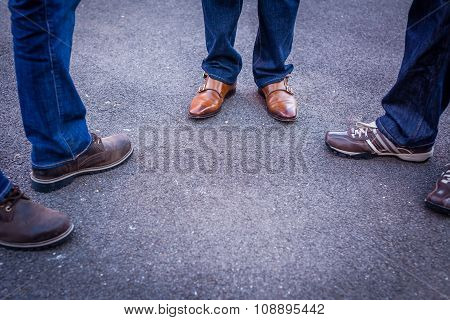 Three men standing
