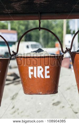 Bucket With Sand In A Petrol Station For Fire Fighting