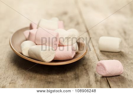 Sweet Marshmallow On A Plate On Wooden Background