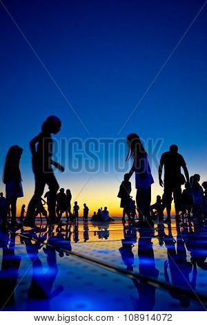 People Silhouette On Colorful Sunset