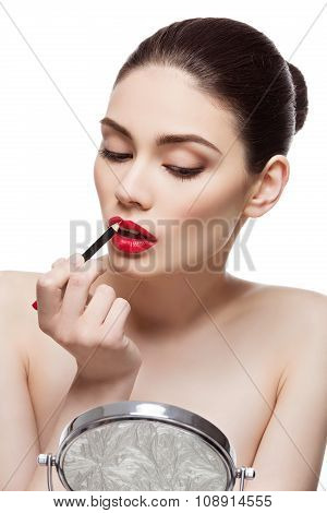 Beautiful girl with lip pencil