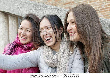 best friends 3 happy multicultural girls having fun