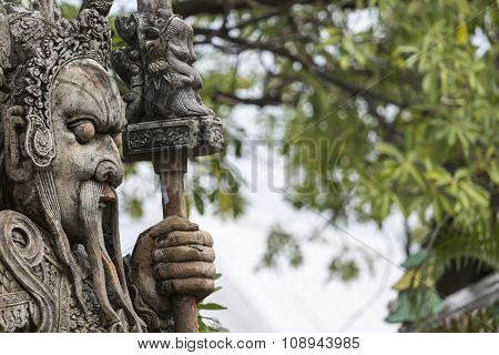 Statue Of A Chinese Warrior Near An Entrance Of Wat Pho. Wat Pho Is A Buddhist Temple Complex In The