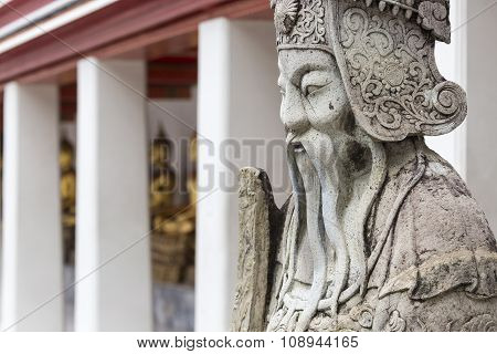 Statue Of A Chinese Warrior Near An Entrance Of Wat Pho. Wat Pho Is A Buddhist Temple Complex In The
