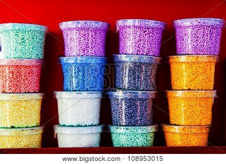 colored plastilina in boxes