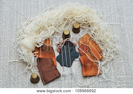 Set for a cobbler to sew moccasins.