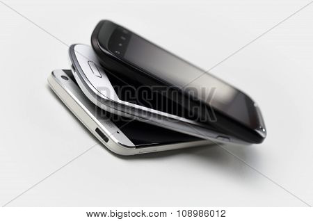 3 Smartphones On Top Of Each Other