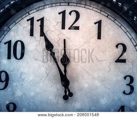 Five minutes to midnight. New Year's clock.