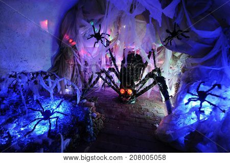 Spidery nest full of an artificial spiders