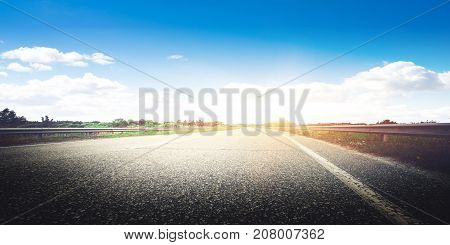 Road way forward direction. Summer morning landscape