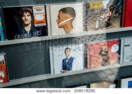 STRASBOURG; FRANCE - OCT 1; 2017: Music record store with audio CD of Stromae; Florent Pagny singer on the shelf