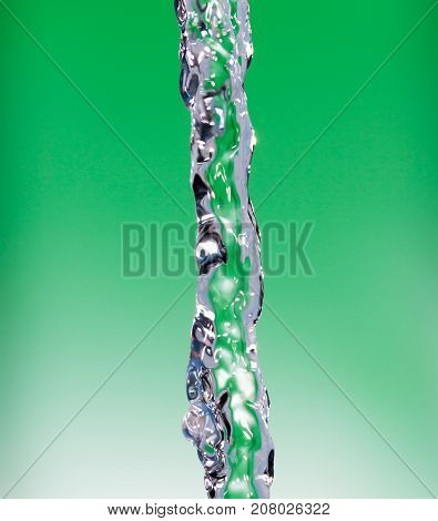 a jet of water on a green background