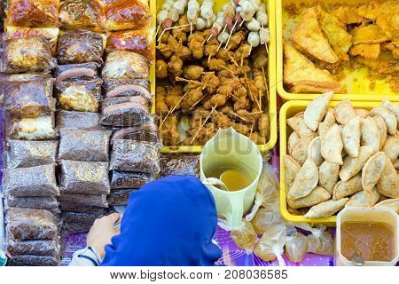 Top View Of Unidentified Stall Vendor Selling Variety Of Malaysian Food, Cakes And Dessert In Kota K
