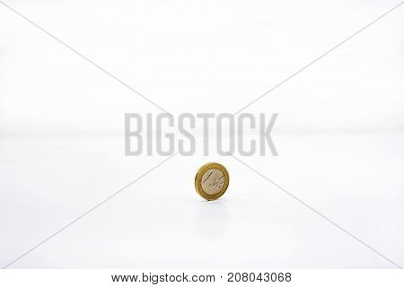 Small Euro Coin On White Table.