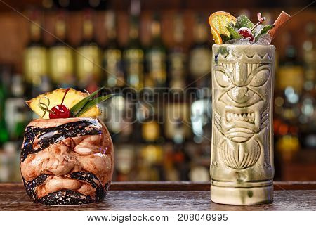 Set of alcoholic tropical cocktails on the bar. Cocktails based on rum coconut cream fruit juices with vanilla. Space for text
