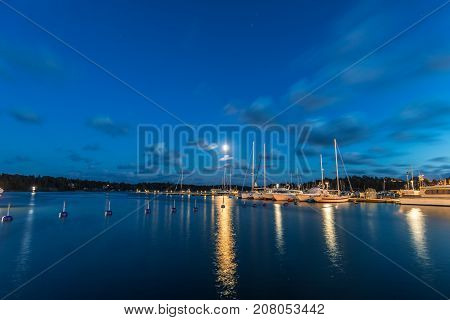 Sailing Boats And Yachts In Marina At Night. Nynashamn. Sweden.