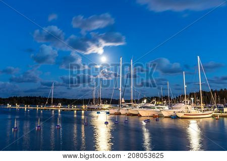 Sailing Boats And Yachts In Marina At Night. Nynashamn. Sweden.