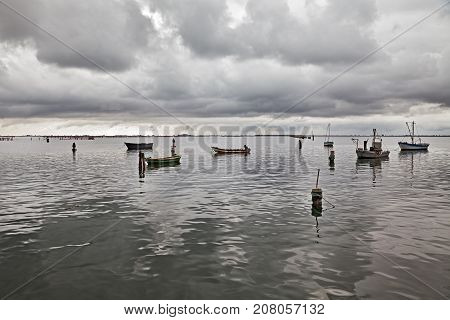 Porto Tolle, Rovigo, Veneto, Italy: marine landscape of the Adriatic sea coast in the Po Delta Park with fishing boats