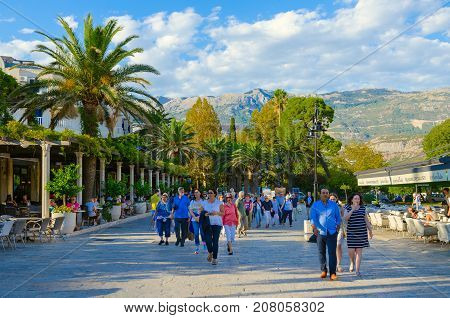 BUDVA MONTENEGRO - SEPTEMBER 5 2017: Unknown people walk around popular resort town of Budva near Old Town and hotel Mogren Montenegro