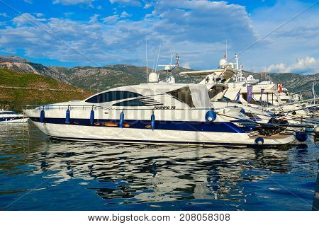 BUDVA MONTENEGRO - SEPTEMBER 5 2017: Pleasure yachts at pier on waterfront of popular resort of Budva Montenegro